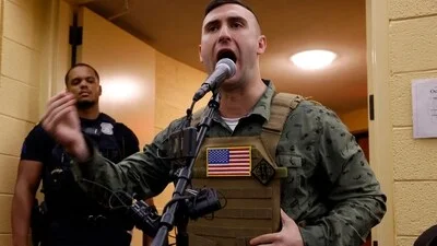 Jake Lang, the far-right activist, took part in a rally in Minneapolis , Minnesota on Saturday
