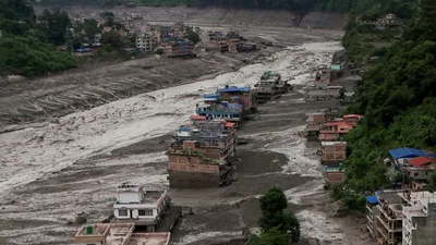 New lakes near Nepal, China border add to flood concerns amid hunt for avalanche trigger