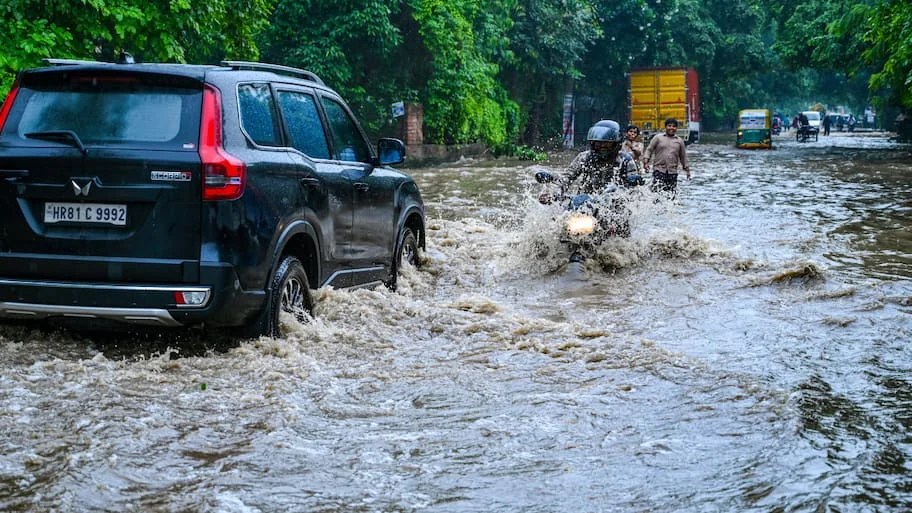 Delhi-NCR woke up to another spell of heavy rain on Tuesday, leaving several roads waterlogged, slowing