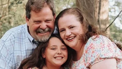 Mike and Mary Moore, who recently adopted a 12-year-old daughter, were tragically killed