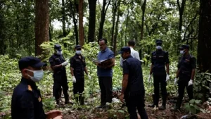 Meanwhile, authorities began the mass burial of decomposing, unidentified victims as morgues
