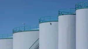 Oil prices experienced a decline on Monday as investors awaited the announcement of new economic