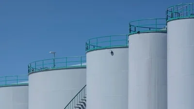 Oil prices experienced a decline on Monday as investors awaited the announcement of new economic