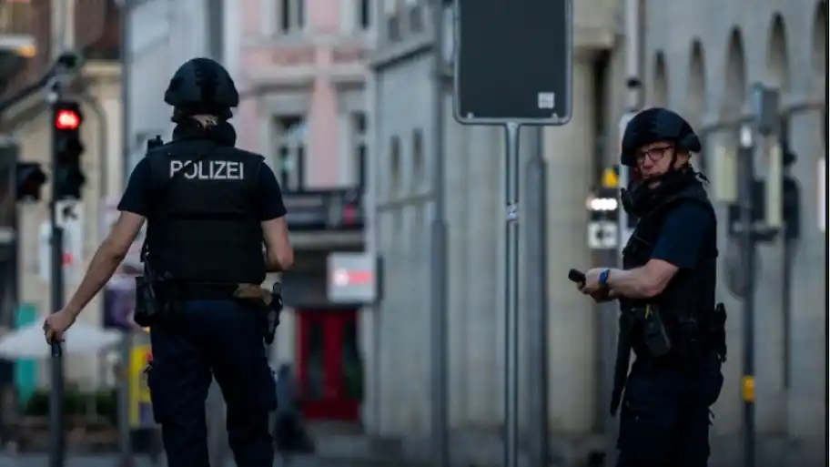 One dead, five injured in shooting at Switzerland rave party; hunt on for gunmen