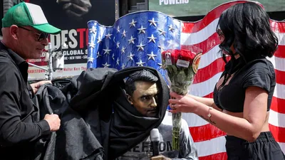 Supporters of slain conservative activist Charlie Kirk and counter-protesters briefly clashed