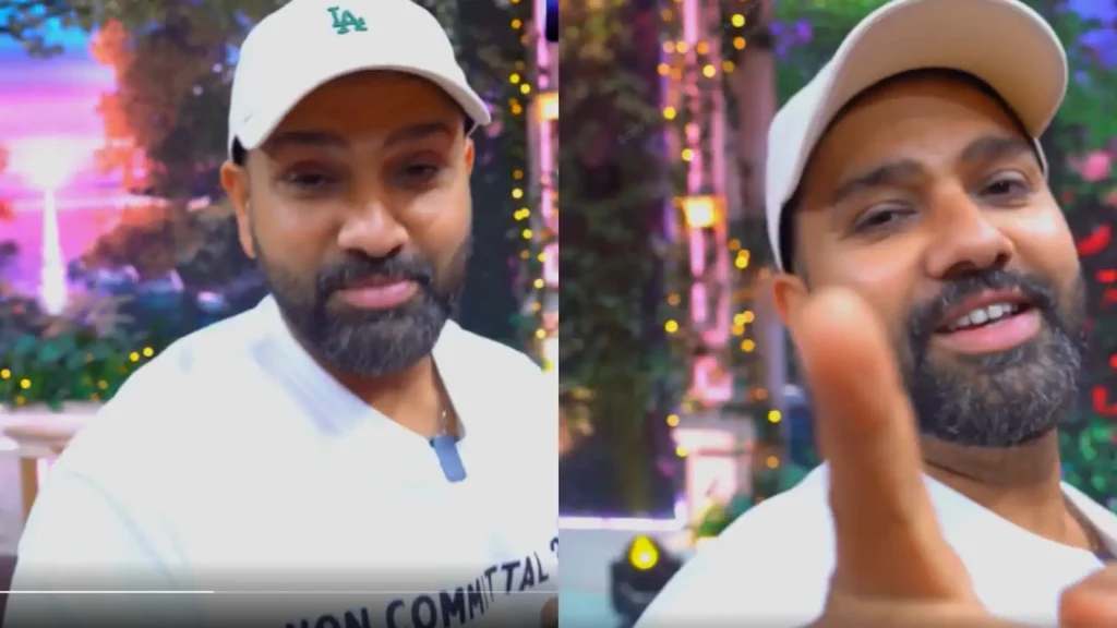 Rohit can be seen wearing a white T-shirt on which the words 'non-committal?' are written