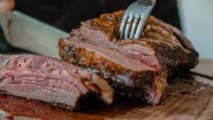 Meatpackers, who buy cattle from farmers and turn steers into beef: The wider industry impact