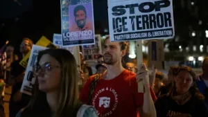 Austin ICE shooting: video shows protesters spray painting 'kill Donald Trump' on wall, 'Time