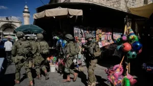 A look at the West Bank crisis — Israel minister's call for war, E1 settlement plan