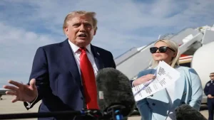 The administration did not explain why Trump was returning a day earlier from Camp David