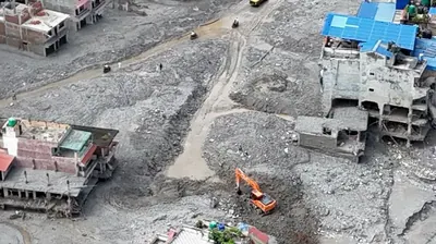 Army footage showed rescuers entering dark tunnels filled with debris, moving through mud
