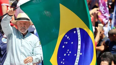Brazil's President Luiz Inacio Lula da Silva and right-wing leader Flavio Bolsonaro appear
