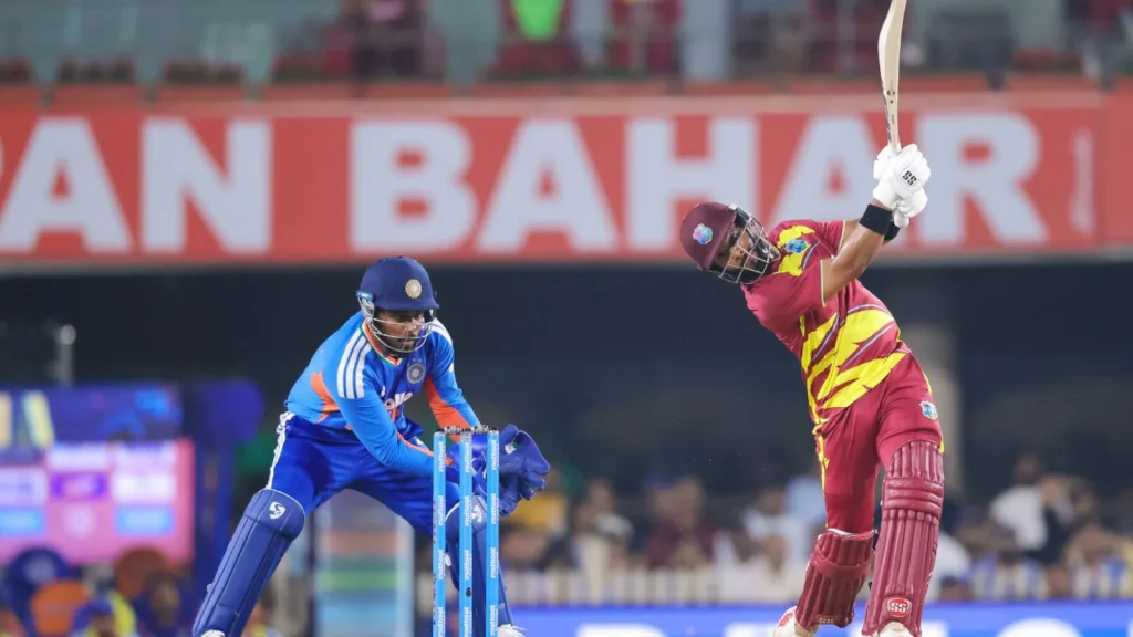 Mayank Yadav spilling a regulation catch of Sherfane Rutherford midway through the West Indies