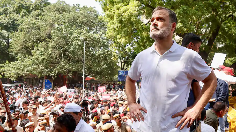 “More than 300 Opposition MPs marched from Parliament to the Election Commission today to meet