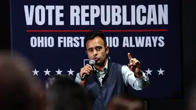 Retired educator Michael Pogue appeared at one of Ramaswamy's campaign gatherings in Cincinnati